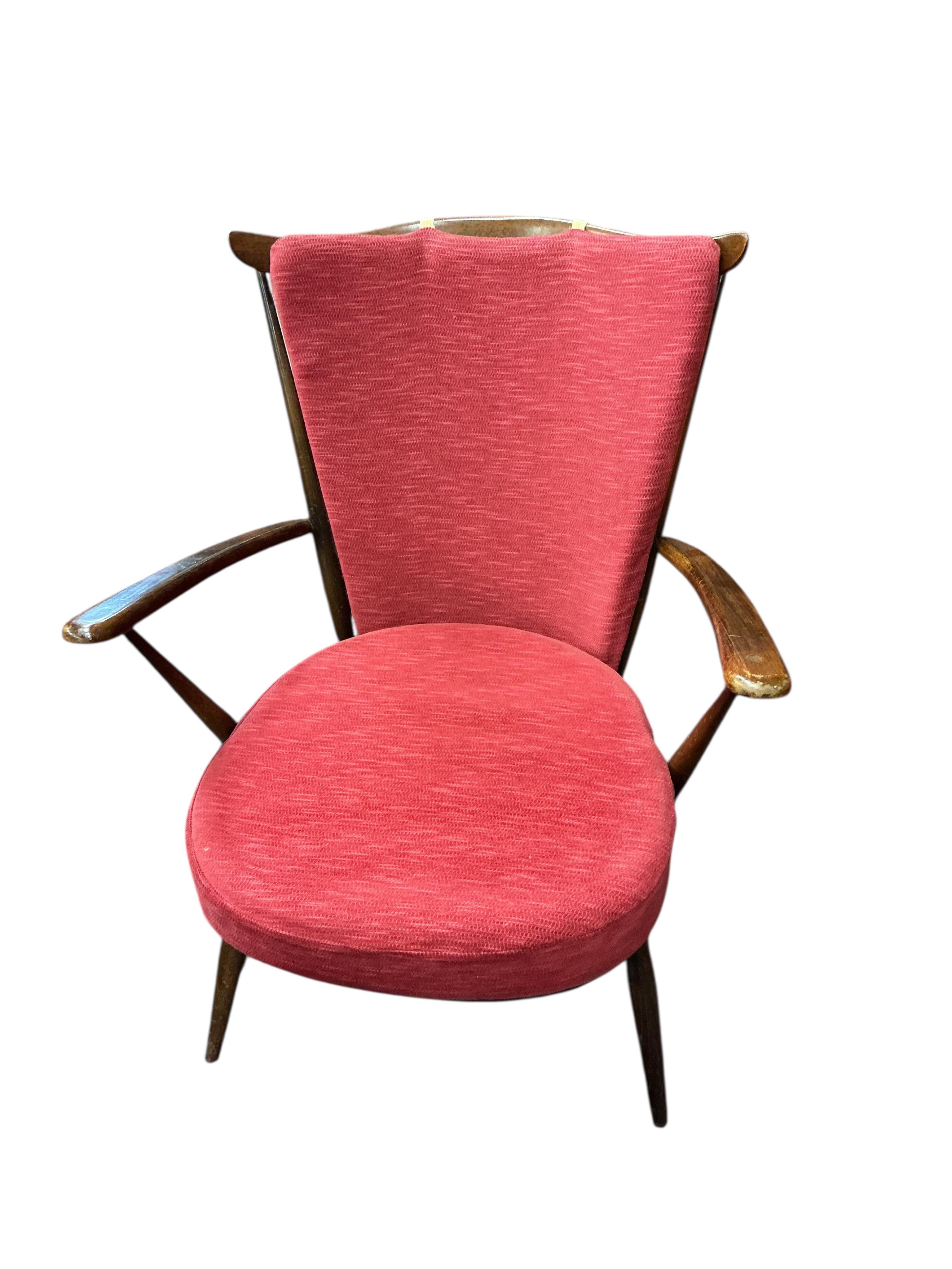A pair of Ercol armchairs, width 70cm, depth 60cm, height 86cm